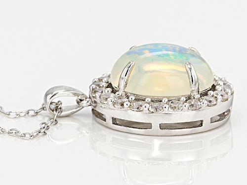 2.50ct Oval Cabochon Ethiopian Opal And .80ctw Round White Zircon Sterling Silver Pendant With Chain