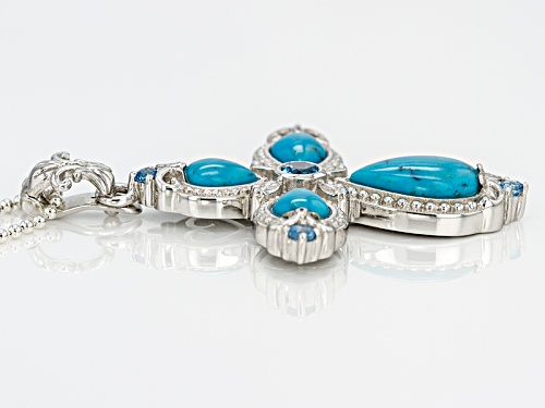 Pear Shape Turquoise And .66ctw Round Swiss Blue Topaz Rhodium Over Silver Cross Enhancer With Chain