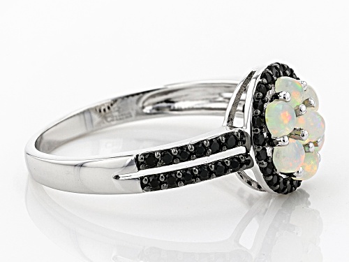 .69ctw Round Ethiopian Opal With .59ctw Round Black Spinel Rhodium Over Sterling Silver Cluster Ring - Size 7
