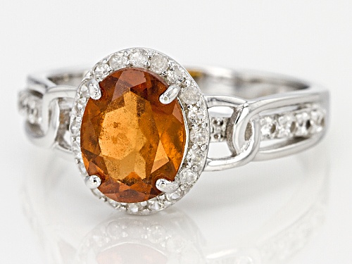 2.20ct Oval Hessonite With .47ctw Round White Zircon Rhodium Over Sterling Silver Ring - Size 8