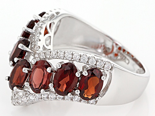 3.50ctw Oval Red Garnet With .67ctw Round White Zircon Rhodium Over Sterling Silver Chevron Ring - Size 7