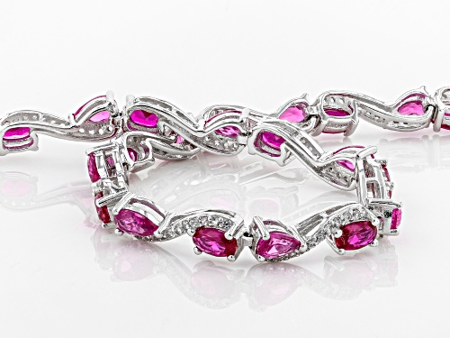 7.38ctw Lab Ruby, Pear Shape Lab Pink Sapphire And Lab White Sapphire Rhodium Over Silver Bracelet - Size 8