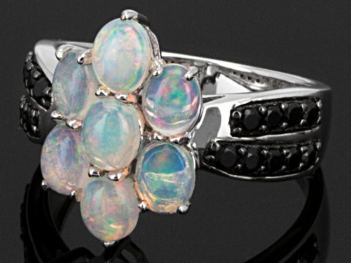1.50ctw Oval Ethiopian Opal With .52ctw Round Black Spinel Sterling Silver Ring - Size 12