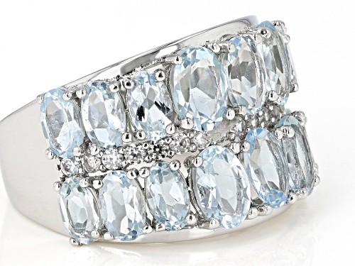 4.85ctw Aquamarine Oval With .45ctw Round White Zircon Rhodium Over Sterling Silver Band Ring - Size 7