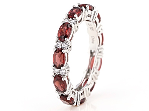 3.93ctw Oval Red Garnet  With 0.38ctw Round White Zircon Rhodium Over Sterling Silver Band Ring - Size 8
