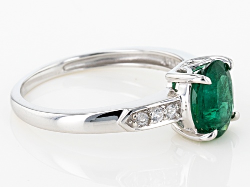1.16ct Oval Emerald Color Apatite With .06ctw Round White Zircon Rhodium Over 10k White Gold Ring. - Size 7