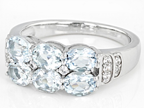 1.60ctw Oval Aquamarine And 0.12ctw White Zircon Rhodium Over Sterling Silver Ring - Size 8