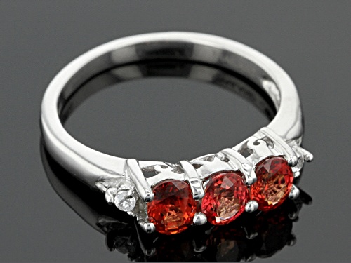 Exotic Jewelry Bazaar™ .98ctw Oval Red Winza Sapphire And .04ctw White Zircon 3-Stone Silver Ring - Size 12