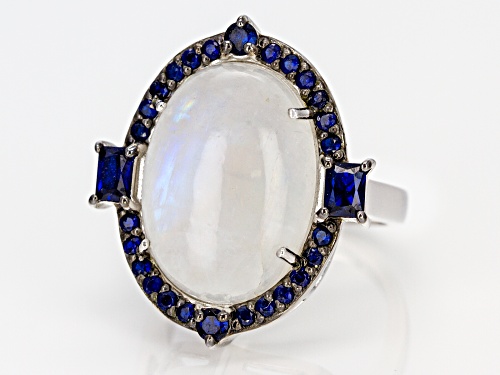 18X13MM OVAL RAINBOW MOONSTONE & .75CTW LAB CREATED BLUE SPINEL RHODIUM OVER SILVER RING - Size 7