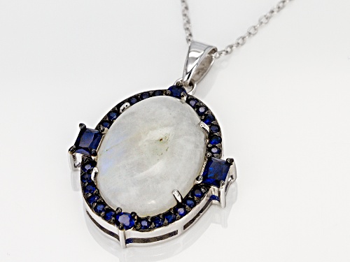 18x13mm oval rainbow moonstone & .75ctw lab created blue spinel rhodium over silver pendant w/chain