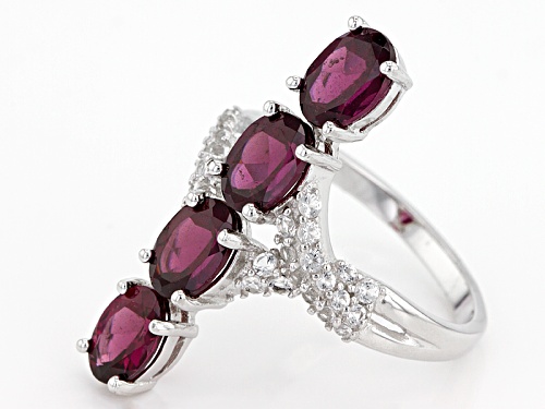 3.41ctw Oval Raspberry color Rhodolite With .47ctw Round White Topaz Sterling Silver 4-Stone Ring - Size 5