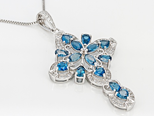 3.38ctw Mixed London Blue Topaz With .19ctw White Topaz Rhodium Over Silver Cross Pendant With Chain
