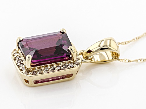 1.57ct Emerald Cut Grape Color Garnet With .08ctw Champagne Diamond Accent 10k Gold Pendant W/Chain