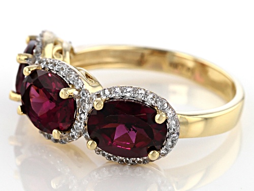 3.90ctw Oval Grape Color Garnet With 0.36ctw Round White Zircon 10k Yellow Gold 3-Stone Ring - Size 7