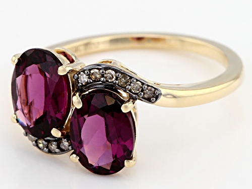 2.79ct Oval Grape Color Garnet With 0.06ctw Round Champagne Diamond Accent 10k Yellow Gold Ring - Size 8