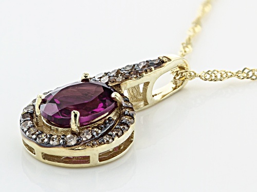1.23ct Oval Grape Color Garnet With .24ctw  Accent Diamond 10k Yellow Gold Pendant With Chain