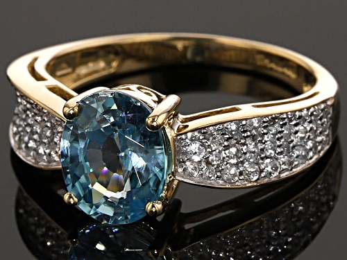 2.34ct Oval Blue Zircon With .42ctw Round White Zircon 10k Yellow Gold Ring - Size 9
