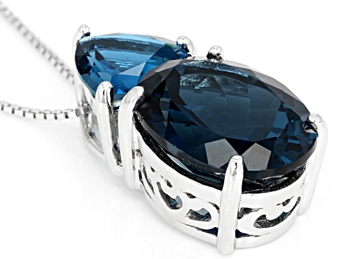 10.20CT OVAL AND 2.76CT TRILLION LONDON BLUE TOPAZ RHODIUM OVER STERLING SILVER PENDANT WITH CHAIN