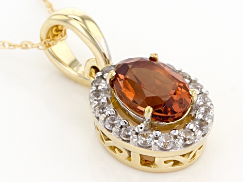 1.28ct Oval Malaya Garnet And .14ctw Round White Zircon 10k Yellow Gold Pendant With Chain