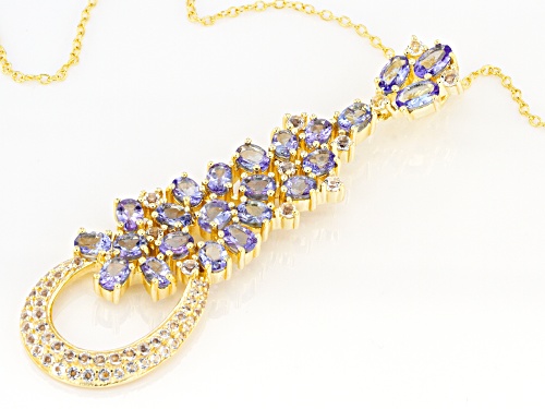 4.06ctw Oval Tanzanite With .93ctw Topaz 18k Yellow Gold Over Silver Pendant With Chain