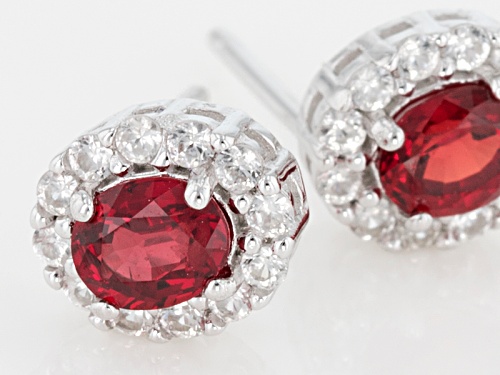 .83ctw Oval Red Sapphire And .42ctw Round White Zircon Sterling Silver Stud Earrings