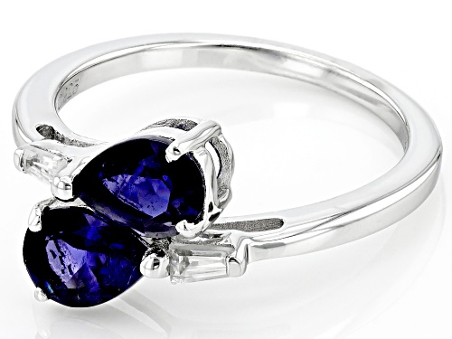 .98ctw Pear Shape Iolite With .18ctw Baguette White Zircon Rhodium Over Sterling Silver Bypass Ring - Size 8