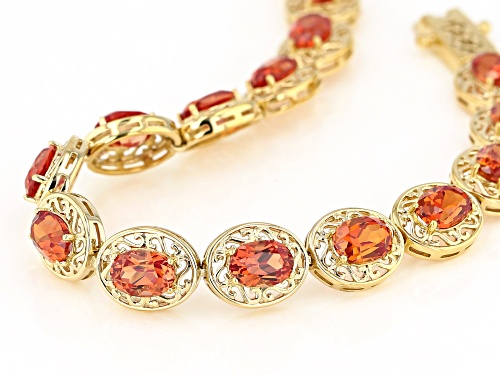 16.72ctw oval lab created sunset sapphire 18K yellow gold over sterling silver tennis bracelet. - Size 8