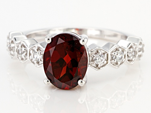 1.78ct Oval Red Garnet and .04ctw Round White Zircon Rhodium Over Sterling Silver Ring - Size 8
