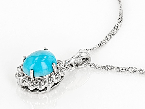 9x7mm Oval Sleeping Beauty Turquoise With .08ctw White Zircon Rhodium Over Silver Pendant With Chain