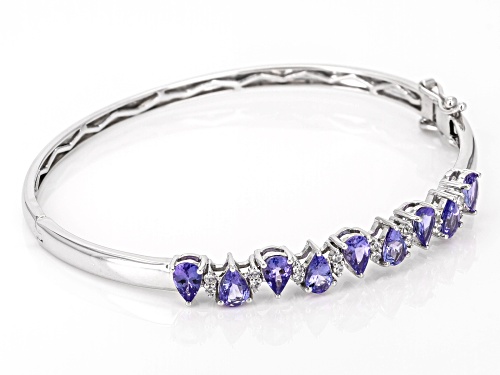 3.24ctw Tanzanite With 0.18ctw White Zircon Rhodium Over Sterling Silver Bangle Bracelet - Size 8