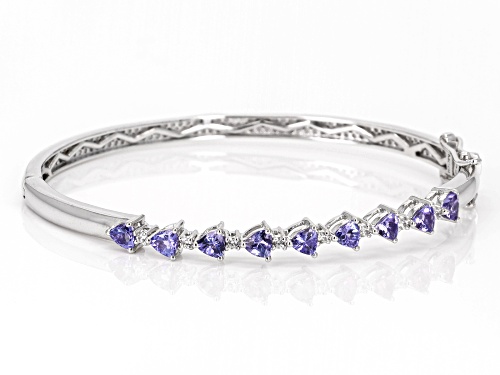 1.78ctw Tanzanite with 0.64ctw White Zircon Platinum Over Sterling Silver Bangle - Size 8