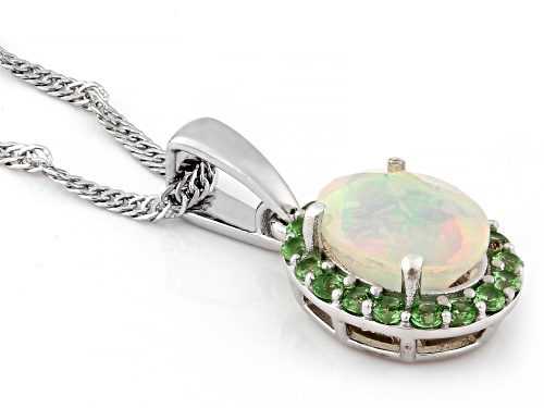 0.95ct Ethiopian Opal with 0.32ctw Tsavorite Rhodium Over Sterling Silver Pendant with Chain