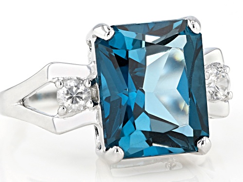 6.38ct Rectangular London Blue Topaz and .27ctw White Zircon Rhodium Over 10k White Gold Ring - Size 7