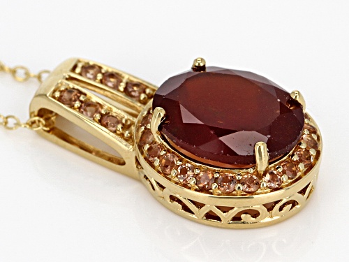 4.37CT OVAL HESSONITE WITH .47CTW ROUND ANDALUSITE 18K GOLD OVER STERLING SILVER PENDANT WITH CHAIN