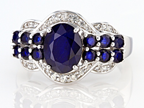 2.83CTW BLUE SAPPHIRE WITH .24CTW WHITE ZIRCON RHODIUM OVER STERLING SILVER RING - Size 7