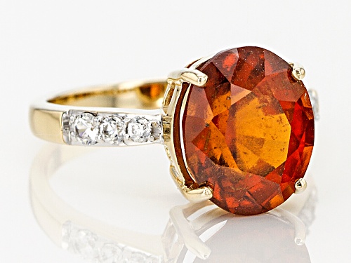 4.30ct Oval Hessonite Garnet And .26ctw Round White Zircon 10k Yellow Gold Ring - Size 7