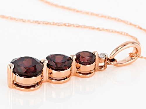 1.87ctw Round Red Zircon With .01ct Round Single Diamond Accent 10k Rose Gold Pendant With Chain.
