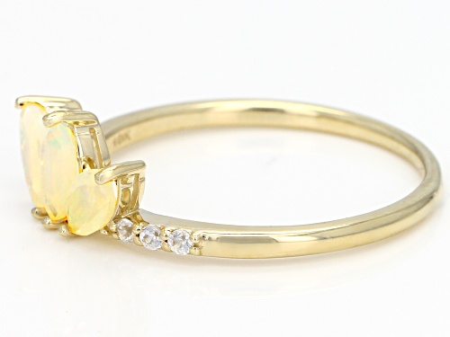 .39ctw Marquise Ethiopian Opal And .10ctw Round White Zircon 10k Yellow Gold 3-Stone Ring - Size 9