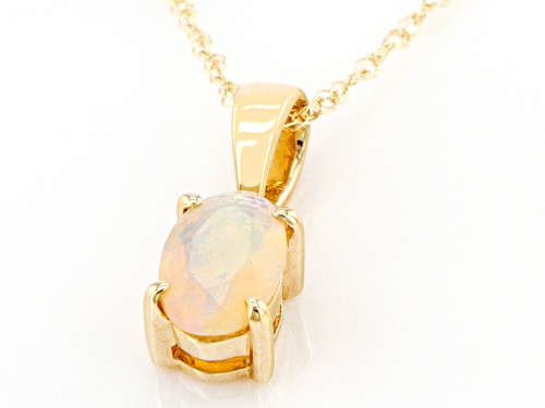 0.20ct Oval Ethiopian Opal 10k Yellow Gold Pendant With Chain