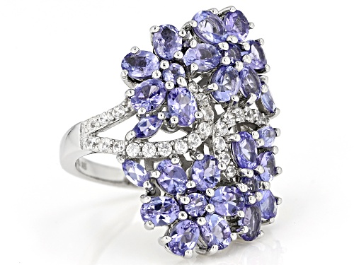 3.33ctw Mixed Shape Tanzanite with .56ctw White Zircon Rhodium Over Sterling Silver Ring - Size 7