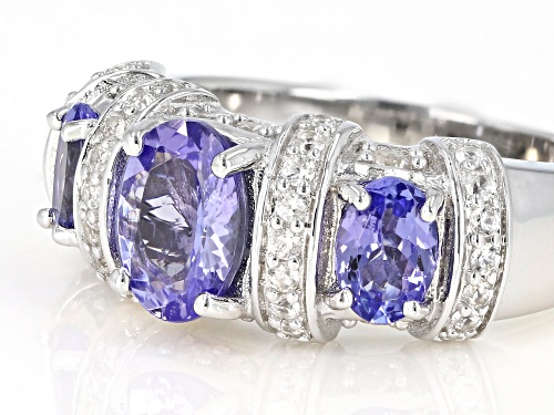 1.83CTW OVAL TANZANITE WITH .62CTW WHITE ZIRCON RHODIUM OVER SILVER 3-STONE BAND RING - Size 7