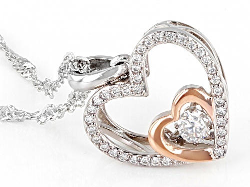 MOISSANITE FIRE(R) .52CTW DEW ROUND PLATINEVE(R) TWO TONE HEART PENDANT & 18 INCH SINGAPORE CHAIN