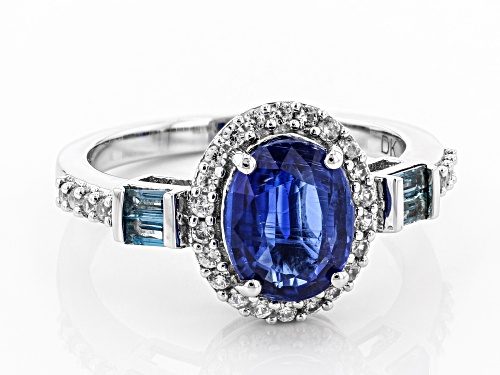 1.28ct Oval Kyanite, .24ctw London Blue Topaz And .34ctw Zircon Rhodium Over Silver Ring - Size 8
