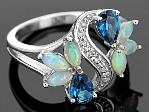 .84ctw Pear Shape London Blue Topaz, .06ctw Round White Topaz, .53ctw Ethiopian Opal Silver Ring - Size 6