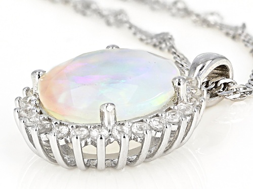 2.04ct Oval Ethiopian Opal With .48ctw Zircon Rhodium Over Silver Halo Pendant With Chain