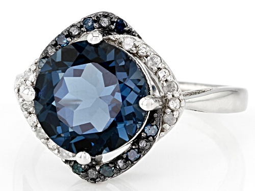 4.25ctw London Blue Topaz With 0.14ctw Blue And White Diamond Rhodium Over Sterling Silver Ring - Size 8