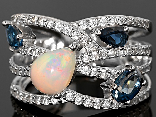 .60ct Ethiopian Opal,.87ctw London Blue Topaz With .56ctw White Zircon Sterling Silver Ring - Size 5