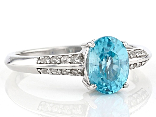 1.60CT OVAL BLUE ZIRCON WITH .12CTW WHITE ZIRCON RHODIUM OVER STERLING SILVER RING - Size 9
