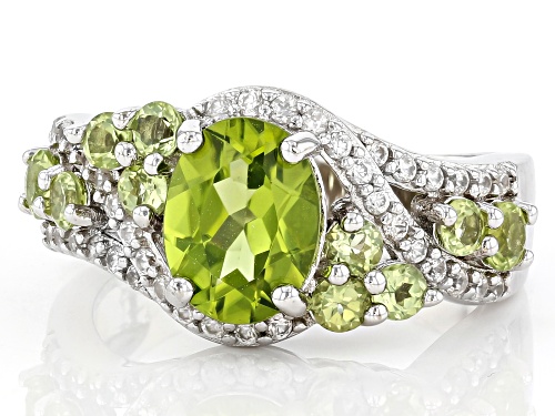 2.45ctw Oval, Round Manchurian Peridot With 0.50ctw Zircon Rhodium Over Sterling Silver Ring - Size 7