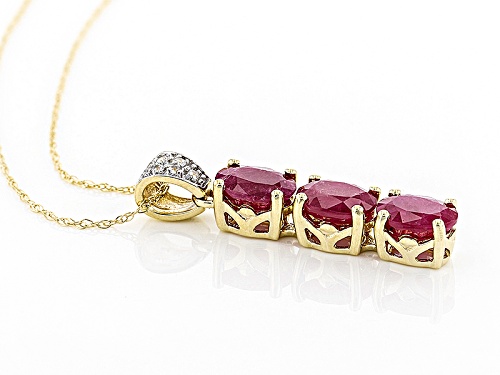 Pre-Owned 2.16ctw Oval Ruby With .02ctw Round White Zircon 10k Yellow Gold 3 Stone Pendant With Chai
